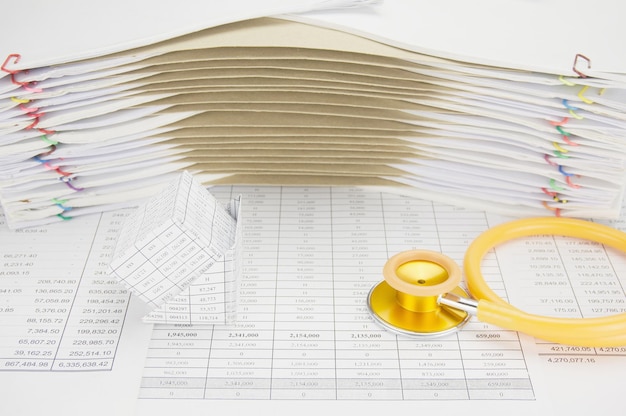 A close-up of various tax documents organized on a desk, including receipts, bank statements, and official DIAN forms.