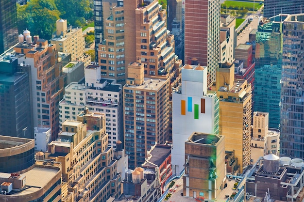 A cityscape of Medellin, Colombia, with financial charts and graphs overlaid, representing financial planning and asset management.